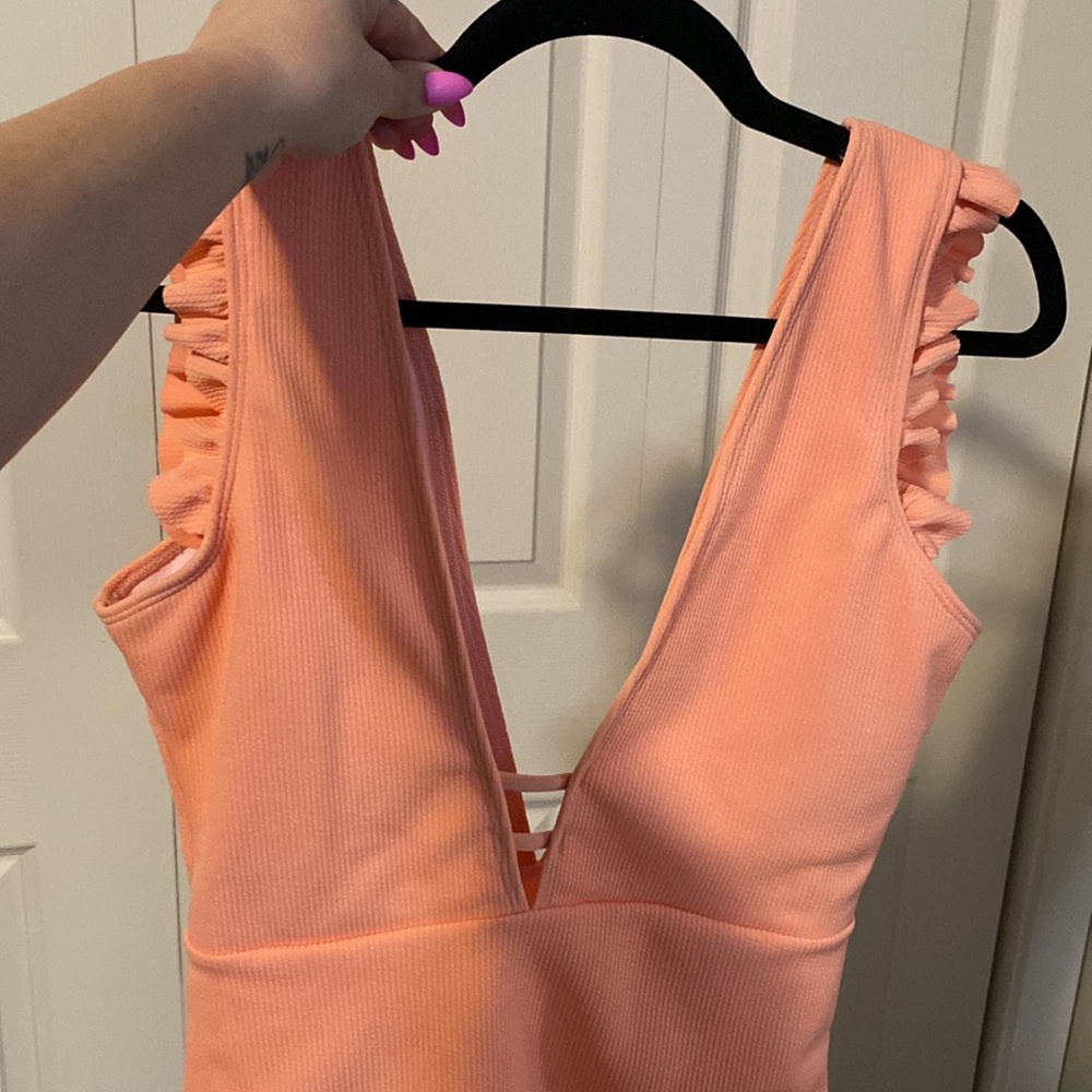 One piece swimsuit. Ruffle shoulders, deep V neckline. Removable padding. - Picture 3 of 5